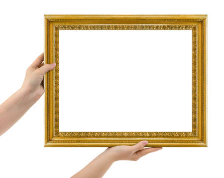 Wooden picture frame in hands isolated on white background