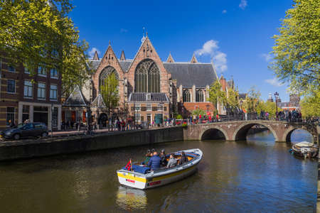 AMSTERDAM NETHERLANDS - APRIL 25, 2017: Central district on April 25, 2017 in Amsterdam Netherlands.のeditorial素材