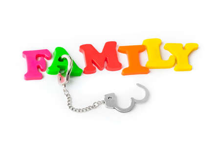 Family and handcuffs isolated on white background