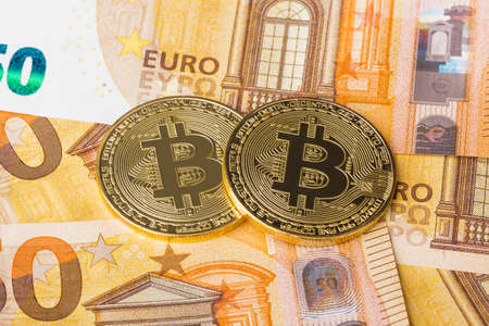 Bitcoins and money - business technology backgroundの写真素材