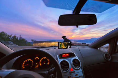 Car interior and mountains road in Kotor Montenegro - travel background