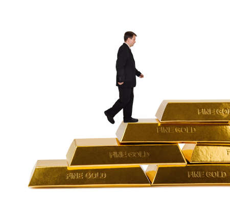 Businessman and stairs made of gold bars isolated on white background