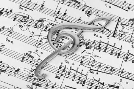 Treble clef on music sheet - musical art backgroundの写真素材