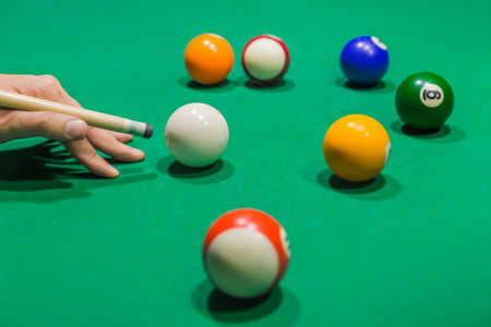 Billiard balls on pool green table - sport backgroundの写真素材