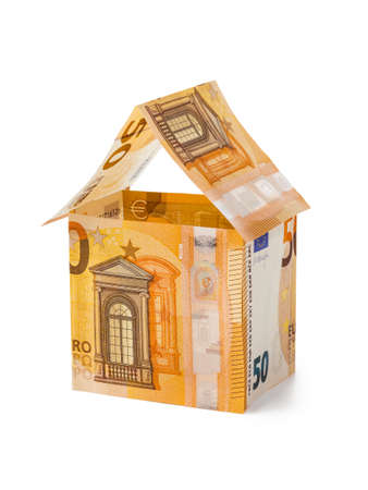 Money house isolated on white backgroundの写真素材