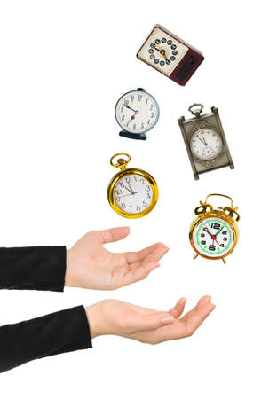 Juggling hands and clocks isolated on white backgroundの写真素材