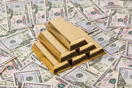 Gold bars and money - business backgroundの写真素材