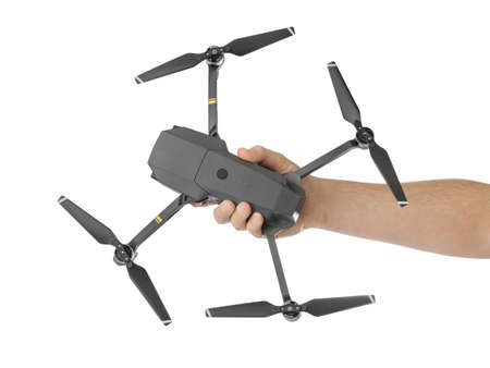 Drone in hand - isolated on white background