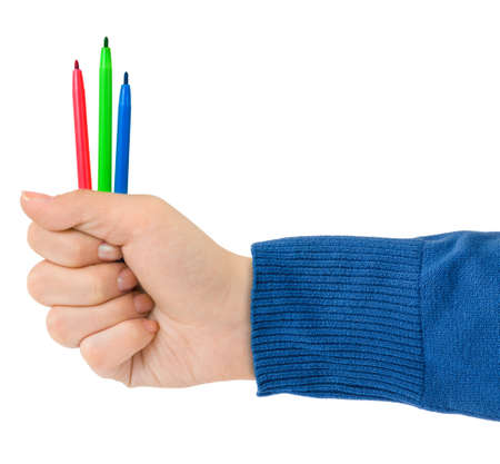 Hand with multicolored pens isolated on white backgroundの写真素材