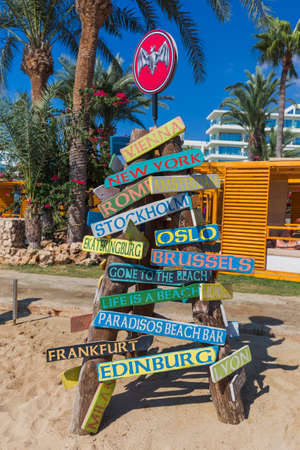 Signpost on the beach in Ayia Napa Cyprus - travel backgroundの写真素材
