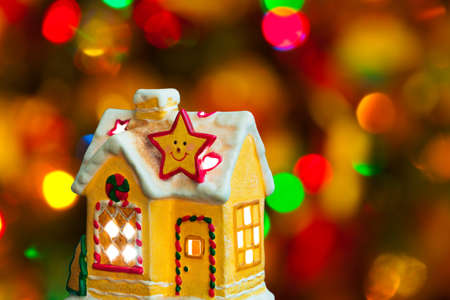 Lighting house - christmas tree on backgroundの写真素材