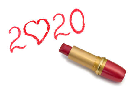 Lipstick and 2020 isolated on white background