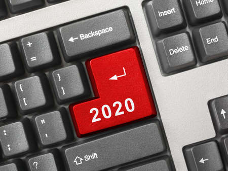 Computer keyboard with 2020 key - holiday conceptの写真素材