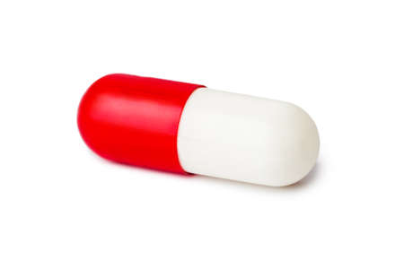 Macro of medical pill isolated on white backgroundの写真素材