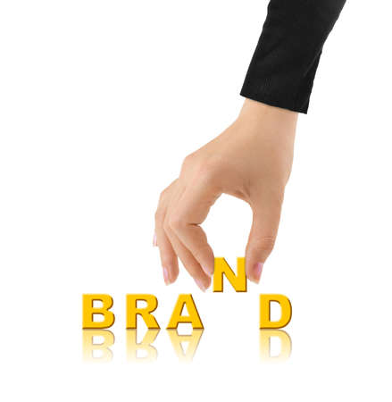 Hand and word Brand isolated on white backgroundの写真素材