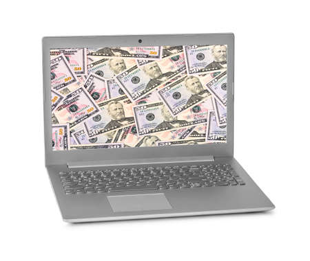 Money on notebook screen isolated on white background