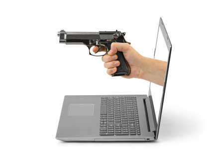 Hand with gun and notebook isolated on white background