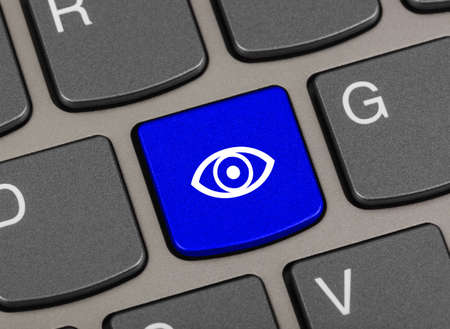 Computer keyboard with Eye key - technology backgroundの写真素材