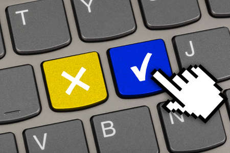 Computer keyboard with Yes and No keys - business concept