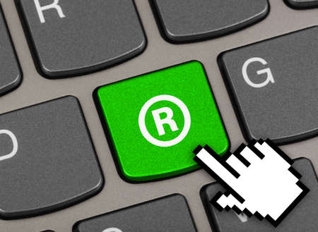 Computer keyboard with Registered mark symbol - business concept