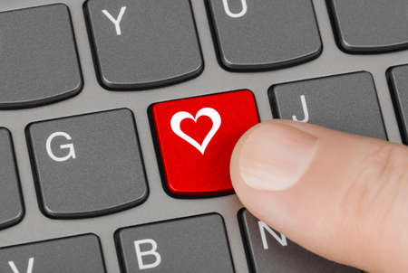 Computer keyboard with love key - internet conceptの写真素材