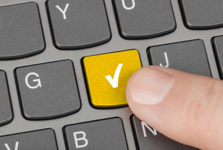 Computer keyboard with agreement key - technology background