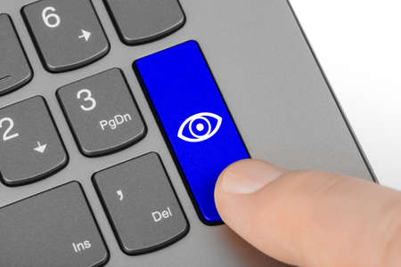 Computer keyboard with Eye key - technology background