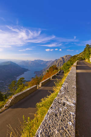 Mountains road and Kotor Bay on sunset - Montenegro - nature and architecture backgroundの写真素材
