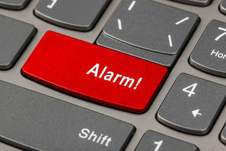 Computer notebook keyboard with Alarm key - technology background