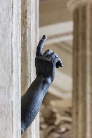Statue with a pointing hand in Kazan Cathedral - Saint-Petersburg Russiaのeditorial素材