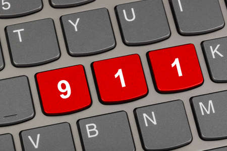 Computer keyboard with 911 key - technology background