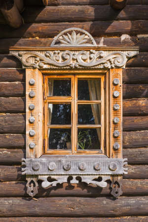 Window of old russian wooden house - architecture backgroundの写真素材