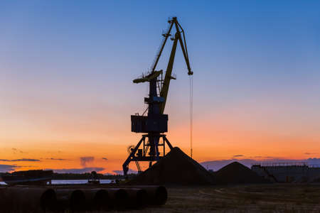 Port crane on sunset - industry backgroundの写真素材