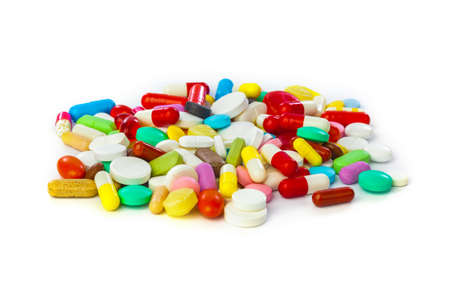 Heap of pills isolated on white background