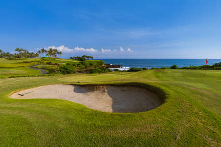 Golf field near Tanah Lot Temple in Bali Indonesia - travel background