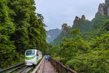 Wulingyuan, China - May 27, 2018: Tourist train in Tianzi Avatar mountains nature parkのeditorial素材