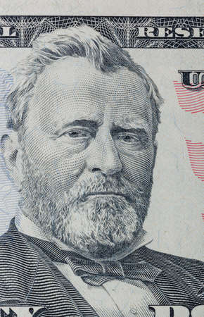 Portrait of Ulysses Grant on a 50 dollars bill - business background