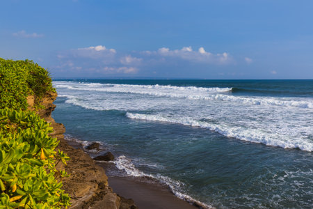 Beach near Tanah Lot Temple in Bali Indonesia - travel backgroundの写真素材
