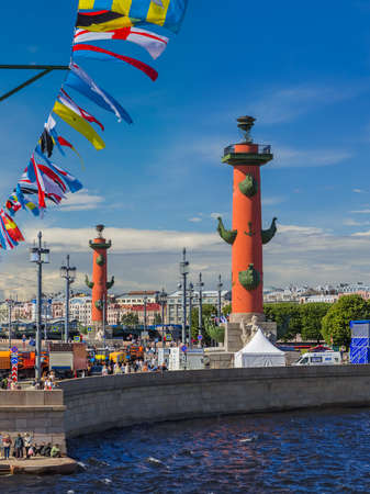 Saint-Petersburg, Russia - July 24, 2020: Rostral columns and the Neva River.