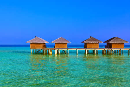 Bungalows on tropical Maldives island - nature travel backgroundのeditorial素材