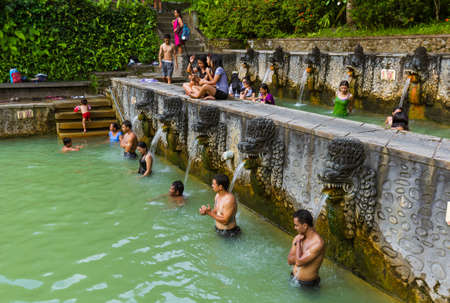 BALI INDONESIA - APRIL 25: People in hot spring Air Panas Banjar on April 25, 2016 in Bali Island, Indonesia.のeditorial素材