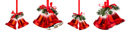 Set of Christmas bells with a red bow isolated on white backgroundの写真素材
