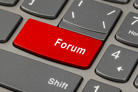 Computer notebook keyboard with Forum key - technology backgroundの写真素材