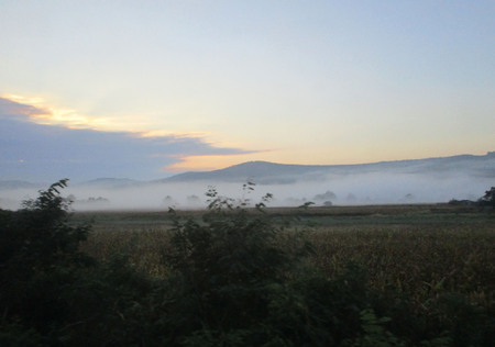 Cloudy and misty landscapeの写真素材