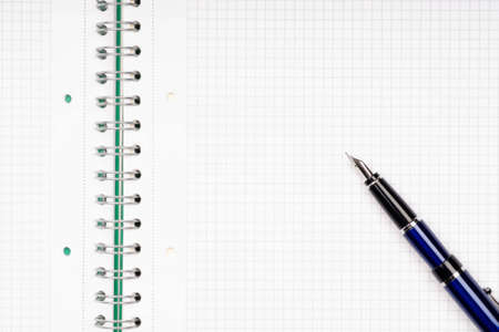 close up of notebook and pencil