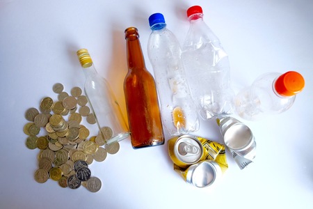 bottles can money with white backgroundの写真素材