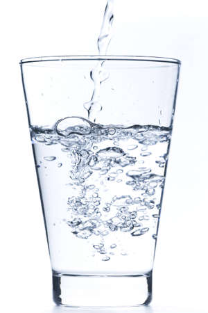 drinking water in a clear glassの写真素材