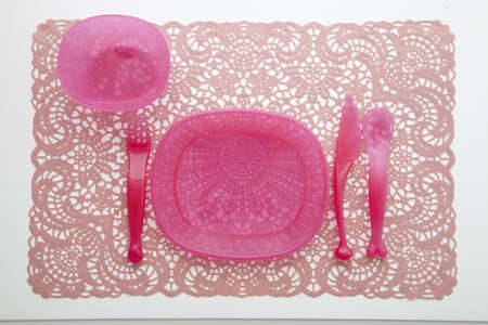 Pink plastic dining set in whiteの写真素材