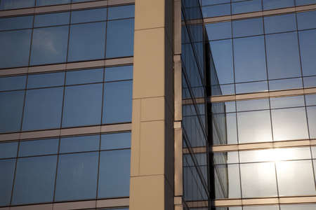sun on miror of modern buildingの写真素材