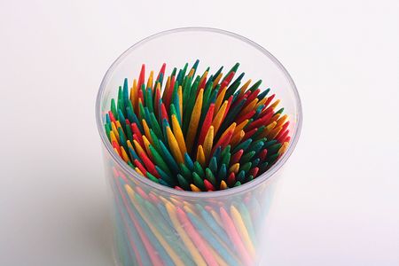 Set of colour toothpicks in plastic glass.の写真素材